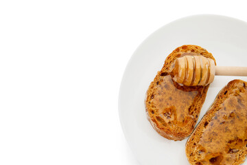 Plate with delicious toasted bread with honey on white background
