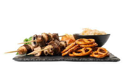 Board with tasty grilled meat and snacks on white background. Oktoberfest celebration