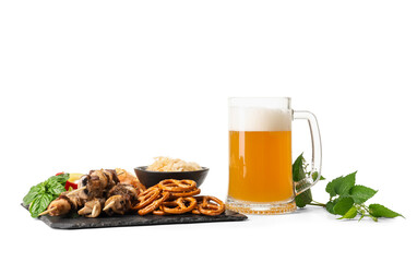 Board with tasty grilled meat, snacks and beer on white background. Oktoberfest celebration