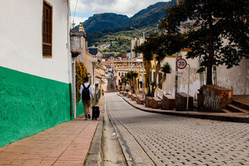 Colonial streets of the La Candelaria neighborhood on a sunny day, a place much visited by...