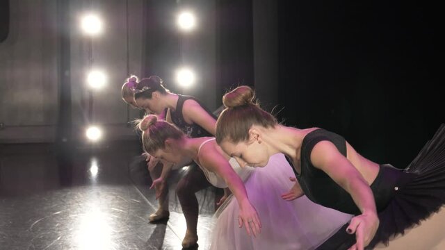 Female Ballerinas Taking A Bow On Stage