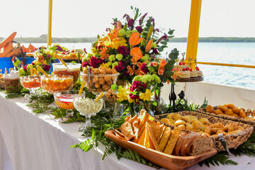 feast on the boat, baker's day, brazilian snacks, buffet on the boat, late afternoon, ornamental...