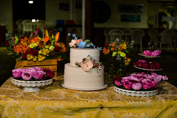 table with sweets & birthday cakes at a night party, condensed milk candy balls, candy balls, sweets table, birthday party,birthday table setting, party table setting, table setting 