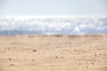 Blur beautiful nature tropical beach with bokeh sun light