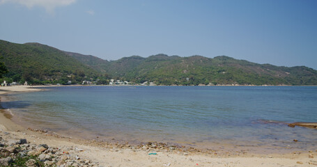 Sea sand beach on sunny day
