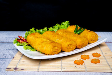 Delicious Risoles or Risol Vegetable is a typical Indonesian traditional street food made from...