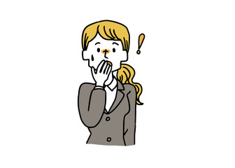 驚いているスーツの女性