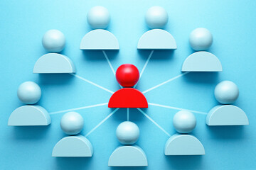 Team network and communication. Hand pointing red person icon block.