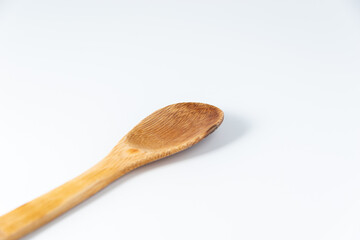 wooden spoon isolated on white background