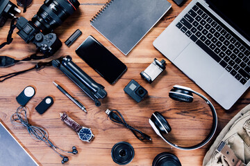  digital camera, charger, camera, lens, video camera, USB, personal laptop, book, pen, glasses,...