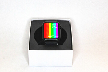 Rectangular smart watch without a label in boxes on a white background.