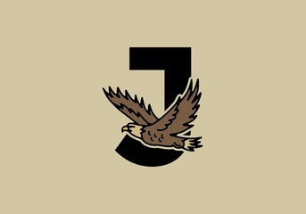 Line art illustration of flying eagle with J initial letter