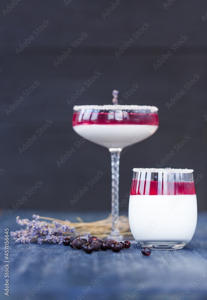 Wall mural Christmas or winter coctail on wooden desk with fir tree.