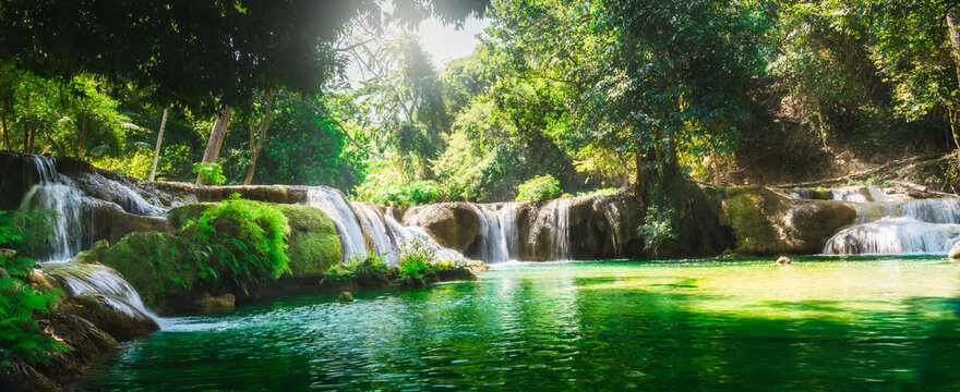 Fototapeta Wide panorama beautiful green nature view scenic landscape waterfall in tropical jungle rain forest, Attraction famous outdoor travel Saraburi Thailand, Spring background, Tourism destination Asi