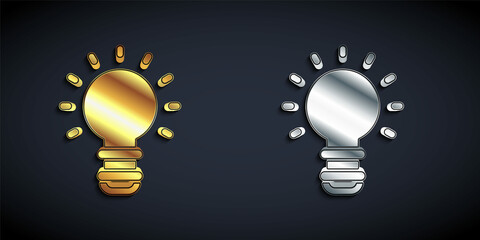 Gold and silver Creative lamp light idea icon isolated on black background. Concept ideas inspiration, invention, effective thinking, knowledge and education. Long shadow style. Vector