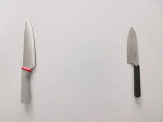kitchen knives on a gray table background
