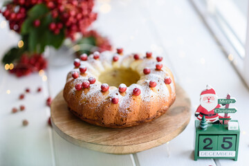 Traditional Christmas cranberry pie. Preparation of the festive table for the celebration of Christmas