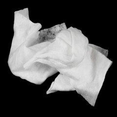 Wet wipes isolated on black background. Wet white used napkins