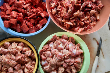 preparation of food for raw feeding. BARF food for dogs and cats. Packaging of food for animals.