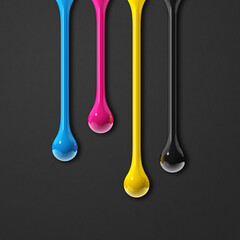 cmyk ink drops on black paper square background