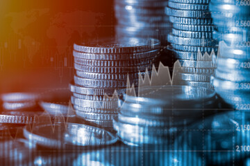 coins stack with stock market or forex trading graph and candlestick chart for financial investment concept, finance online digital technology, economy trends for business, abstract finance background