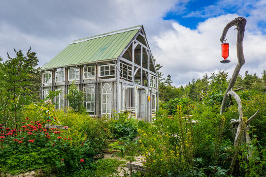 Greenhouse in the plant garden of Pointe Aux Outarde nature park in Quebec region of Cote Nord, Canada