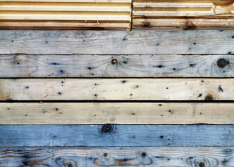 beautiful texture of old scenic assorted wooden boards fastened together