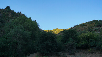 The mountains are blue skies and white clouds