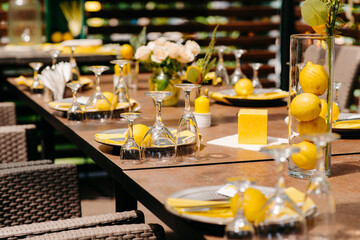 glasses on the table in restaurant, table set for a party, table decor at the restaurant