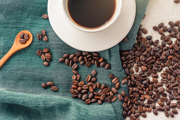 cup of coffee with beans
