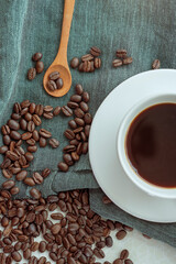 cup of coffee with beans