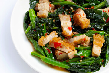 Stir fried chinese kale with crispy pork belly