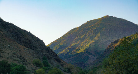 The mountains are blue skies and white clouds