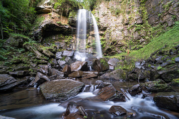 Melincourt Falls, Resolven, Vale of Neath, Port Talbot, South Wales, the United Kingdom. Beautiful Welsh waterfall