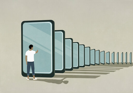 Man standing at smart phone dominoes
