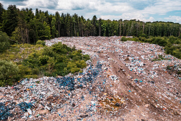 Destruction of forests and ecological system by garbage removal in forests, top view, destructive...