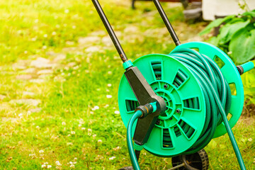 Garden hose for watering plants in garden