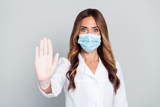 Portrait Of Attractive Woman Doc Wearing Mask Showing Stop Sign No Refuse Protest Isolated Over Grey Pastel Color Background