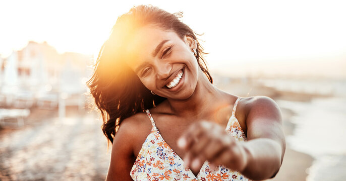 Portrait Of A Young Black Woman Having Fun At Beach Party - Happy Female Enjoying Sunset By The Sea - Beauty, Positive And Happy Lifestyle Concept	
