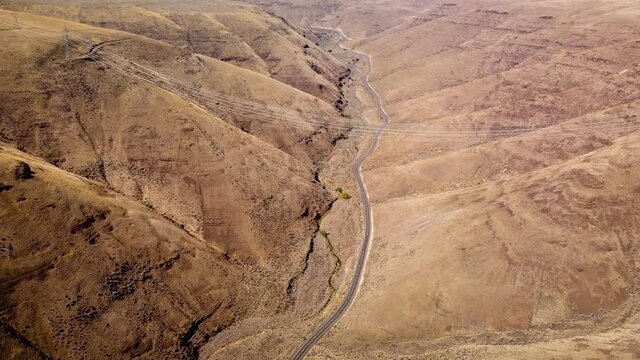 Desert Valley Highway With Powerlines 