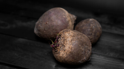 Beet fruits on wooden background