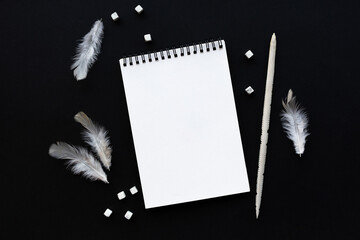 White notebook mockup template on black background with magical mysterious mood.
