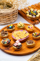 Martabak Mini or Martabak Mini Bangka with various Topping. The martabak mini bangka is made from a mixture of flour, eggs, sugar, baking soda, coconut milk and water.