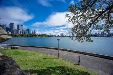 view of Sydney Harbour and CBD commercial and residential buildings, hotels and officer towers on the foreshore in NSW Australia
