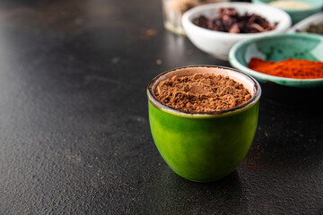 different types spices seasoning mix pungent and spicy herbs, ground spice fresh portion ready to eat meal snack on the table copy space food background rustic top view