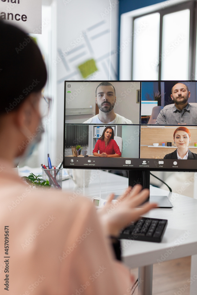 Poster executive manager with medical face mask discussing management statistics with remote team having on