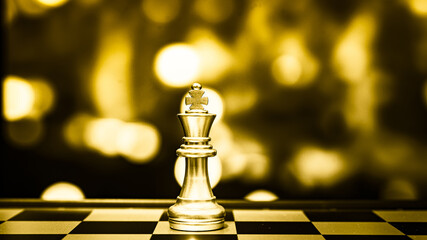 Closeup of chess characters on board games. to represent decision making in term of business strategy to find out the best solution to meet target objective and goal.