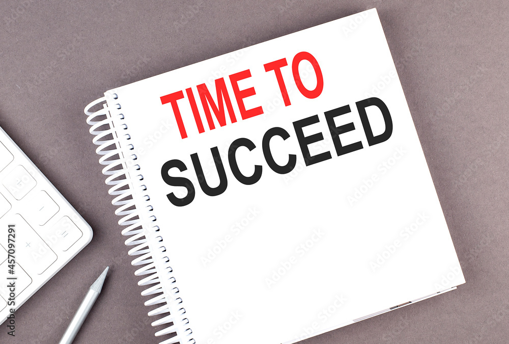 Poster time to succeed text on the notebook with calculator and pen