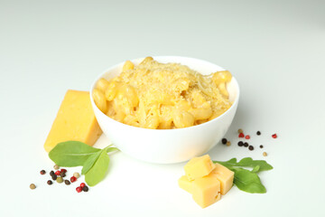 Plate with macaroni and cheese on white background