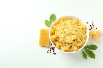 Plate with macaroni and cheese on white background